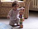 Ekin loves to play with cubes.
